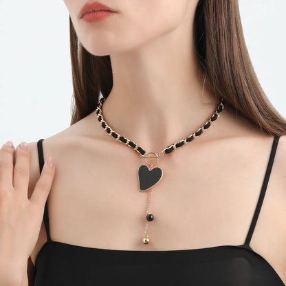 Ig Style Heart Shape Alloy Woven Belt Women'S Pendant Necklace