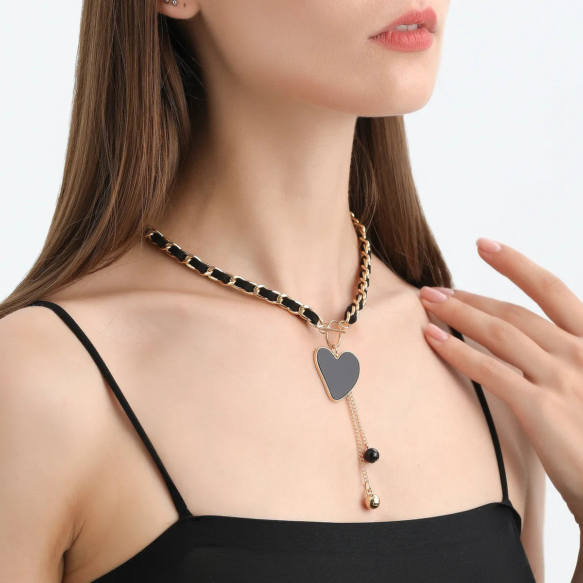 Ig Style Heart Shape Alloy Woven Belt Women'S Pendant Necklace