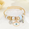 IG Style Modern Style Classic Style Devil'S Eye Bear Butterfly Gold Plated Rhinestones Glass Pearl 304 Stainless Steel Alloy Wholesale Bangle