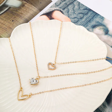 Ig Style Star Moon Heart Shape Alloy Hollow Out Inlay Rhinestones Women's Three Layer Necklace