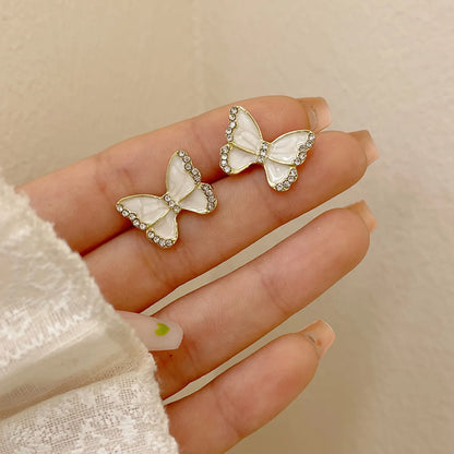 Ins Style Sweet Heart Shape Flower Butterfly Alloy Enamel Plating Inlay Rhinestones Pearl Women'S Drop Earrings Ear Studs