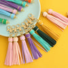 Jewelry Accessories Baotou Artificial Leather Bell Hat Tassel Hemming Long Dog Buckle Tassel Keychain Electroplated Solid Color