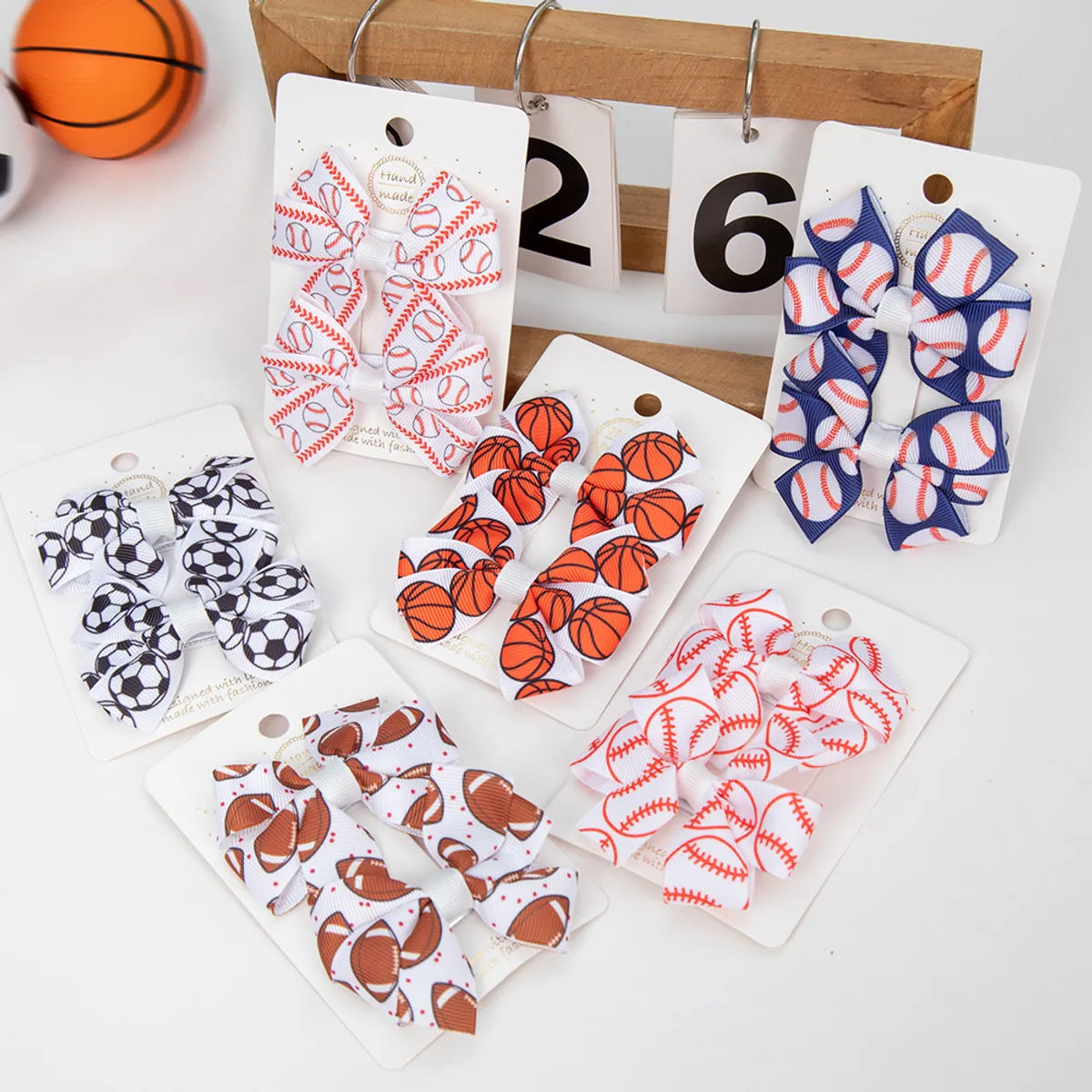 Kid'S Simple Style Classic Style Korean Style Basketball Bow Knot Football Alloy Ribbon Hair Clip