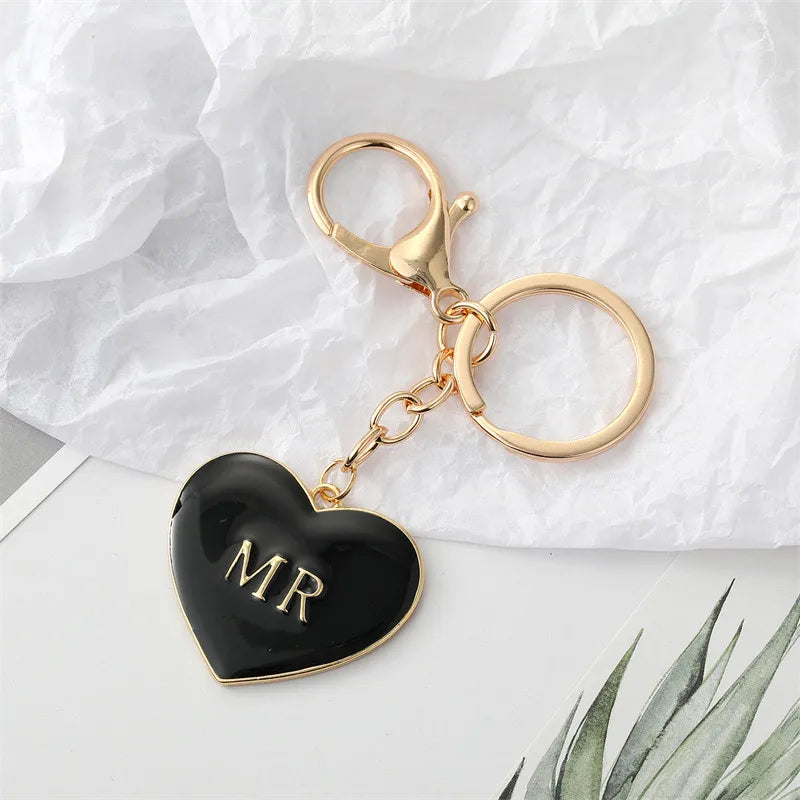 Korea Simple Personality Alloy Black And White Heart-Shape Keychain