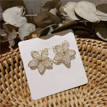 Korean New Fashion Hollow Crystal Flower Earrings Nihaojewelry Wholesale