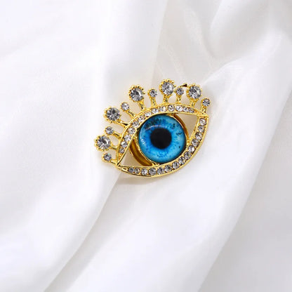 Korean Style Eye Alloy Plating Inlay Artificial Gemstones Women'S Brooches