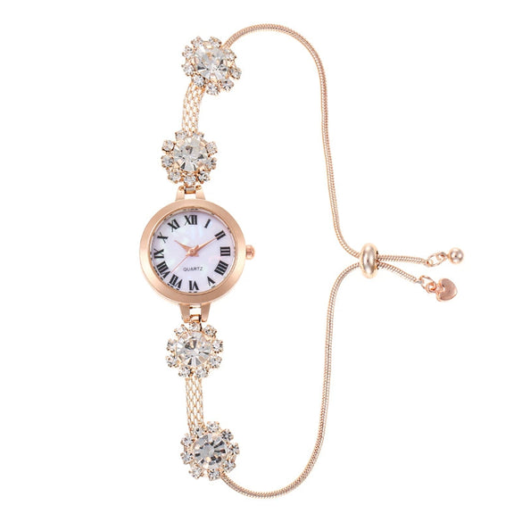 Ladies Alloy Watch Fashionable Round Dial Pullout Bracelet With Roman Numerals