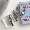 Ladies Casual Metal Quartz Watch With Round Dial And Steel Band