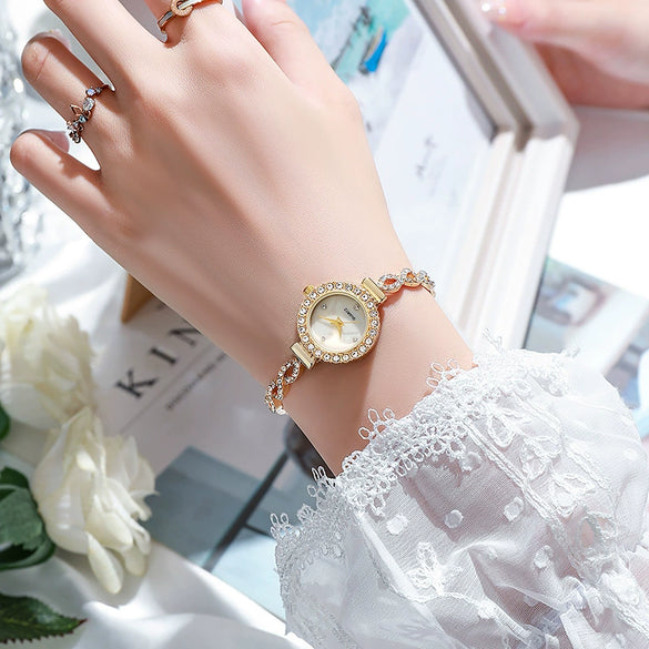 Ladies Casual Quartz Watch With Round Dial Alloy Strap And Buckle