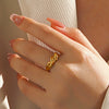 Ladies Stainless Steel Geometric Twist Finger Ring With Electroplating Design