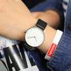 Leisure Quartz Watch Alloy Case Genuine Leather Strap Round Dial For General Gender