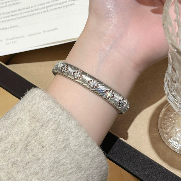 Light Luxury Gold Plated Copper Diamondshaped Flower Zircon Brushed Finish Hollow Bracelet