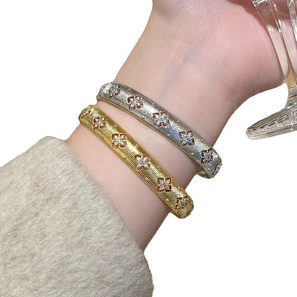 Light Luxury Gold Plated Copper Diamondshaped Flower Zircon Brushed Finish Hollow Bracelet