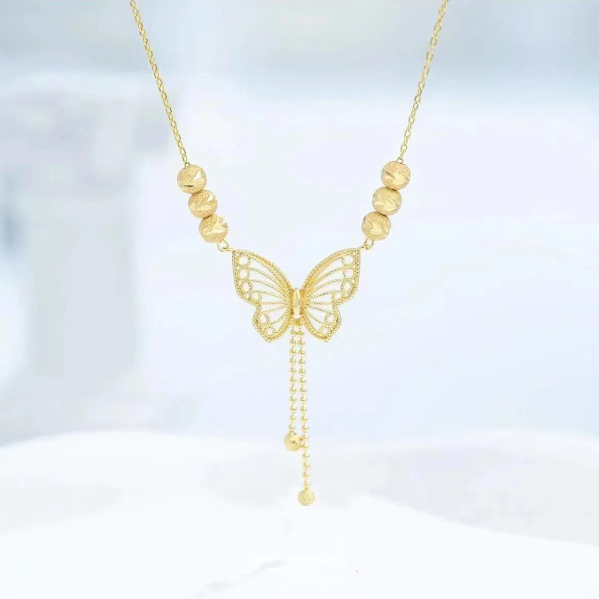 Live Hot Butterfly Tassel Titanium Steel Necklace Women's Fashion Dignified Hollow Five Lucky Beads Butterfly Clavicle Chain Necklace