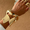 Metal Geometric Personality Electroplated Spring Bracelet With Irregular Wave Opening Design