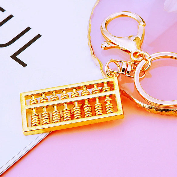 Metal Keychain Pendant With Ruyi Abacus Design For Women