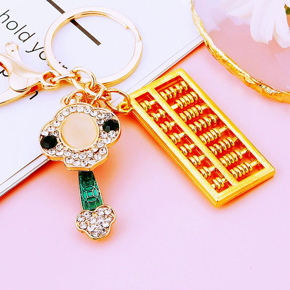 Metal Keychain Pendant With Ruyi Abacus Design For Women