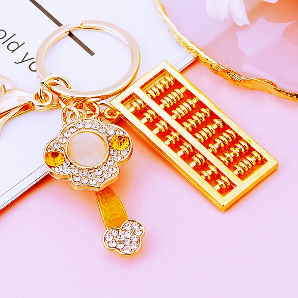 Metal Keychain Pendant With Ruyi Abacus Design For Women