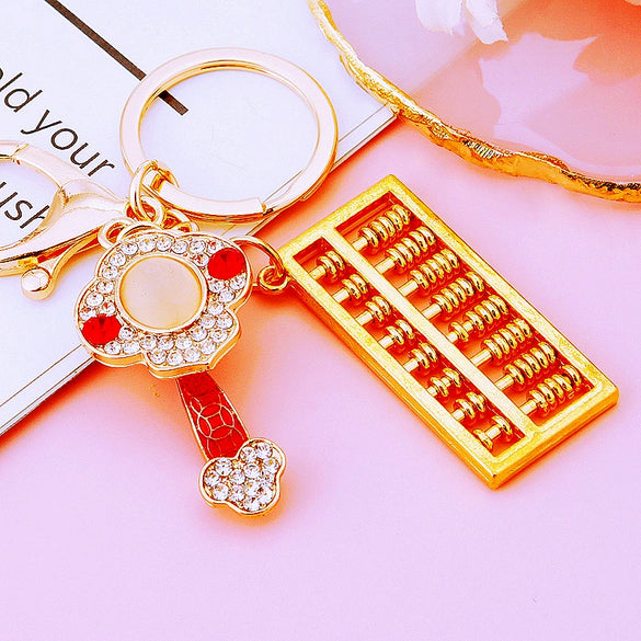 Metal Keychain Pendant With Ruyi Abacus Design For Women