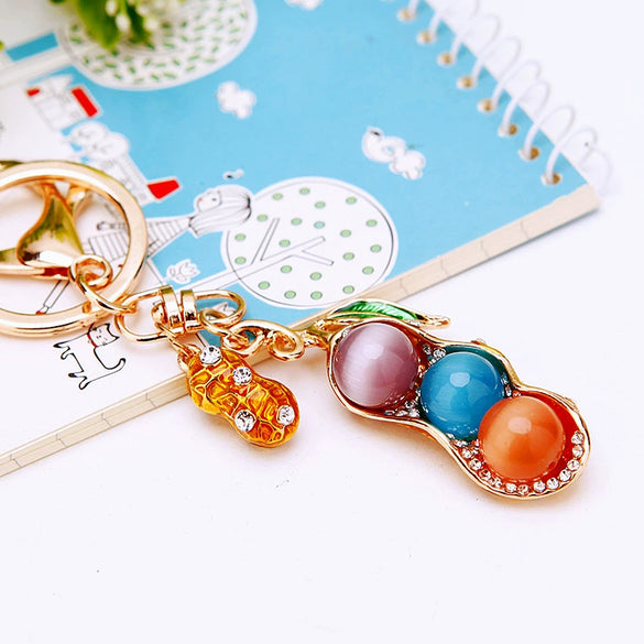 Metal Peanut Shaped Rhinestone Opal Keychain And Bag Pendant