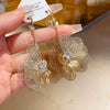 Metal Tassel Earrings With Flower Pattern Electroplated In Silver Needle Style Fashion Light Luxury Cold Retro Allmatch Highend For Women