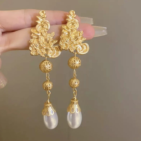 Metal Tassel Earrings With Flower Pattern Electroplated In Silver Needle Style Fashion Light Luxury Cold Retro Allmatch Highend For Women