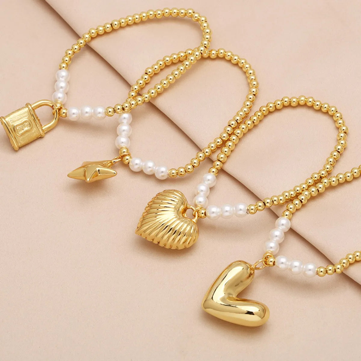 Modern Style Simple Style Star Heart Shape Lock 18K Gold Plated Artificial Pearl Copper Wholesale Bracelets