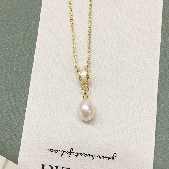 Natural Freshwater Pearl Necklace With Dropshaped Pendant And Riceshaped Pearls