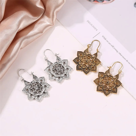 New Bohemian Metal Carved Retro Hollow Flowers Ear Buckle Earrings Wholesale