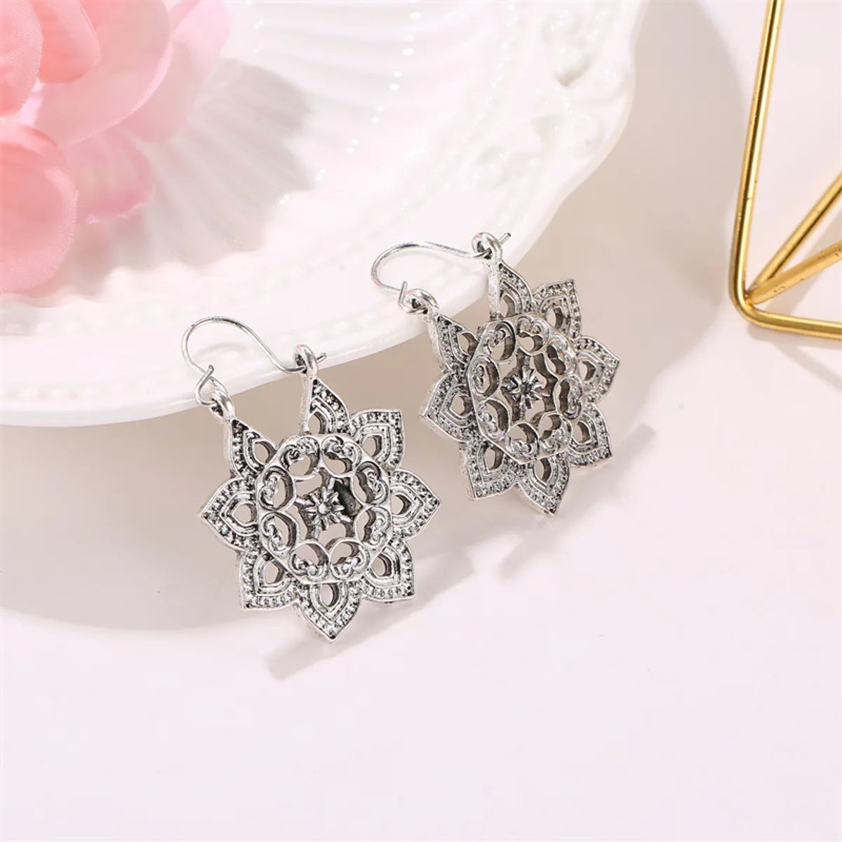 New Bohemian Metal Carved Retro Hollow Flowers Ear Buckle Earrings Wholesale