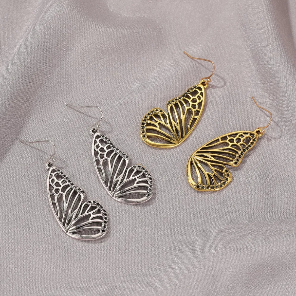 New Long Gold Butterfly Pendant Earrings Retro Hollow Half Butterfly Earrings Wholesale Gooddiy