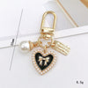 New Style Metal Airpods Protective Case Keychain Pendant With Electroplating For Women