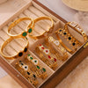 Niche Geometric Hollow 316L Stainless Steel Goldplated Bracelet With Inlaid Diamond Design