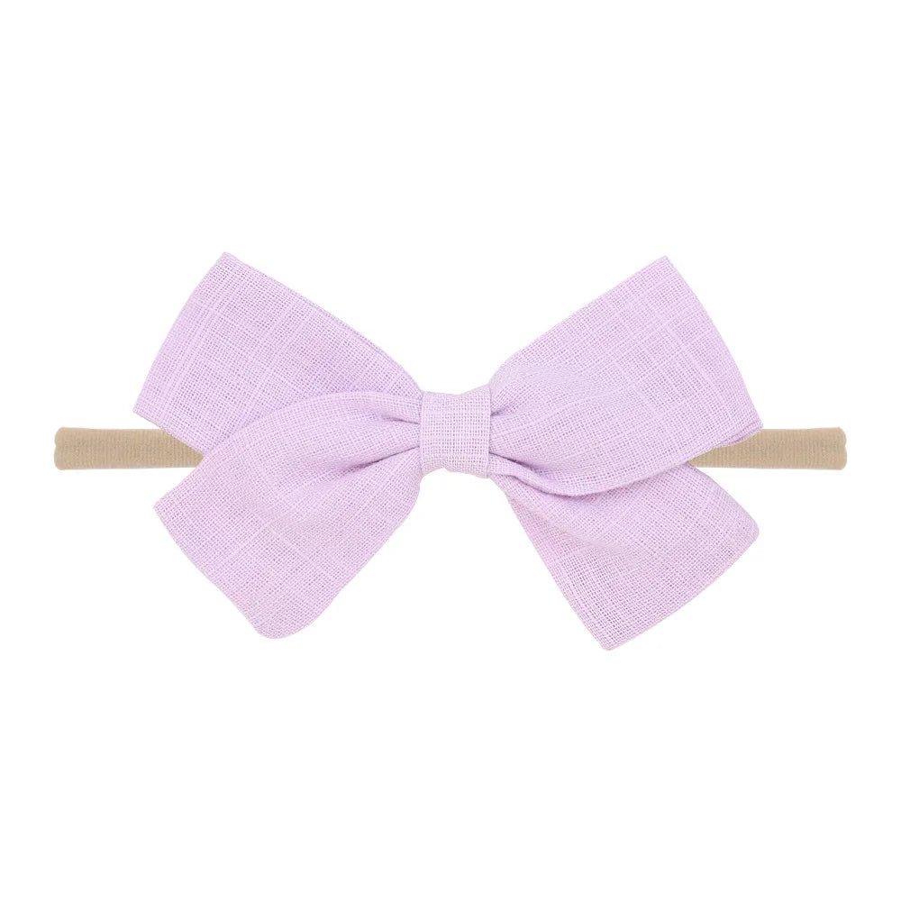 Nihaojewelry Cute Children'S Cotton And Linen Fabric Bow Hair Band Wholesale Jewelry