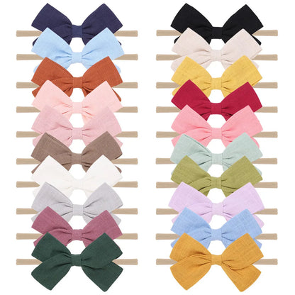 Nihaojewelry Cute Children'S Cotton And Linen Fabric Bow Hair Band Wholesale Jewelry