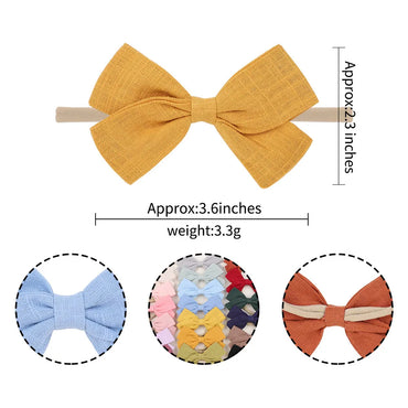 Nihaojewelry Cute Children'S Cotton And Linen Fabric Bow Hair Band Wholesale Jewelry