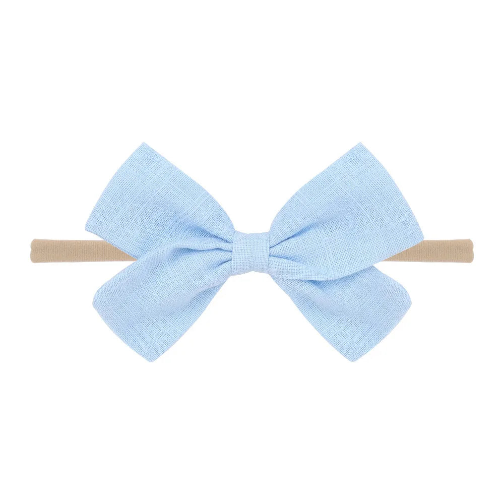 Nihaojewelry Cute Children'S Cotton And Linen Fabric Bow Hair Band Wholesale Jewelry