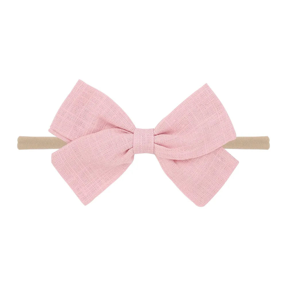 Nihaojewelry Cute Children'S Cotton And Linen Fabric Bow Hair Band Wholesale Jewelry