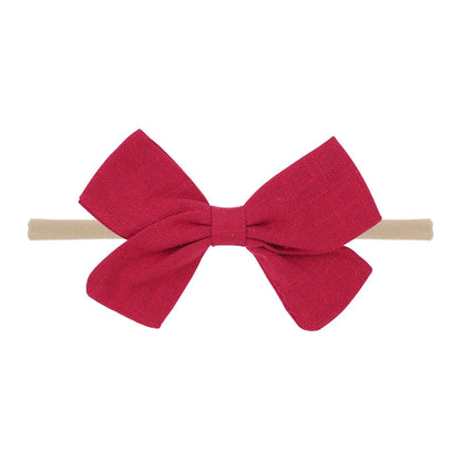 Nihaojewelry Cute Children'S Cotton And Linen Fabric Bow Hair Band Wholesale Jewelry