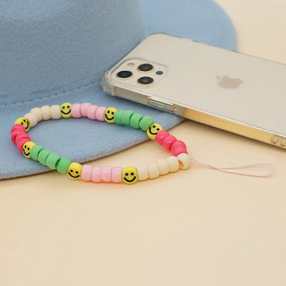 Nihaojewelry Wholesale Accessories Yellow Soft  Smile Acrylic Color Beads Mobile Phone Strap