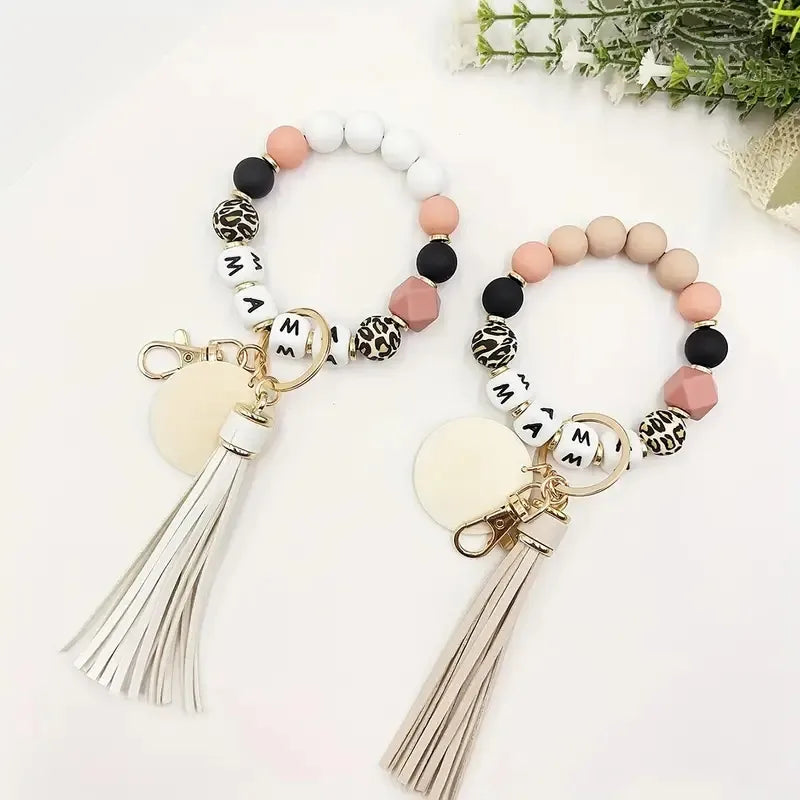 Novelty Classic Style Letter Tassel Key Pu Leather Silica Gel Metal Round Tassel Mobile Phone Chain Bracelets Keychain