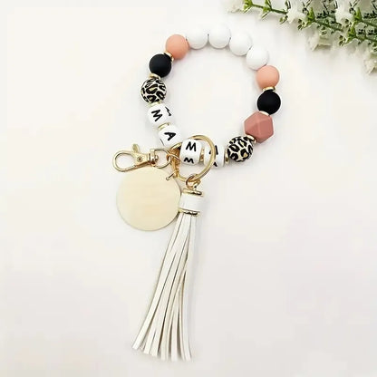 Novelty Classic Style Letter Tassel Key Pu Leather Silica Gel Metal Round Tassel Mobile Phone Chain Bracelets Keychain