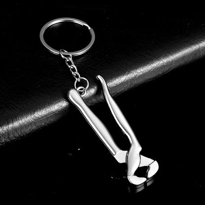 Novelty Solid Color Alloy Polishing Plating Unisex Bag Pendant Keychain