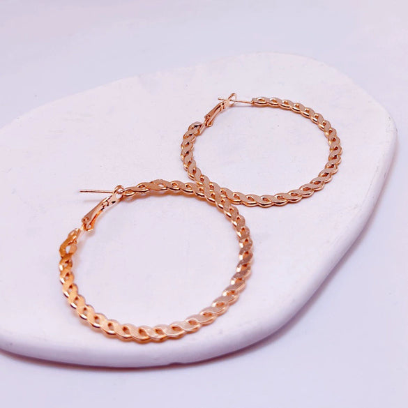 Oversized Twisted Hoop Earrings In Metal With Electroplated Finish And Exaggerated Street Style Design