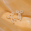 Pearl Bow Titanium Steel Earrings Electroplated Light Luxury Style For Women