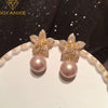 Petal Pearl Earrings With S925 Silver Needle And Golden Flower Design Electroplated