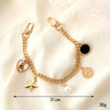 Portable Chain Mobile Phone Case Keychain Lanyard Wrist Bag Chain Antilost Metal Bow Tie Bag Beauty Head Semimanual Style