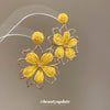 Raffia Flower Hand Knitted Alloy Earrings For Women With High End Sense