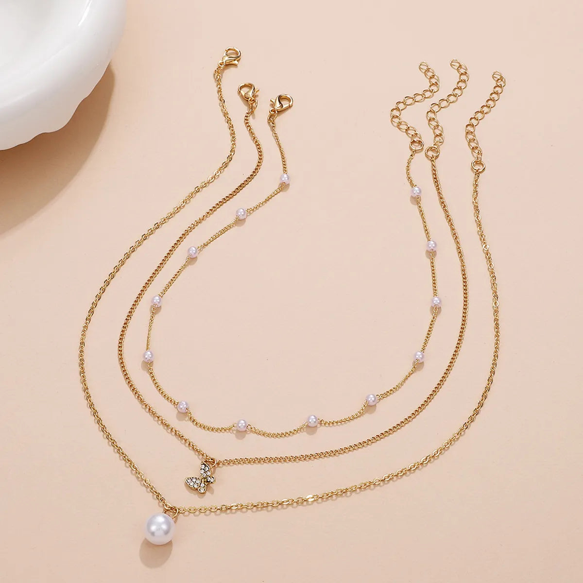 Retro Cross Palm Butterfly Alloy Inlay Artificial Pearls Rhinestones 14k Gold Plated Women's Layered Necklaces