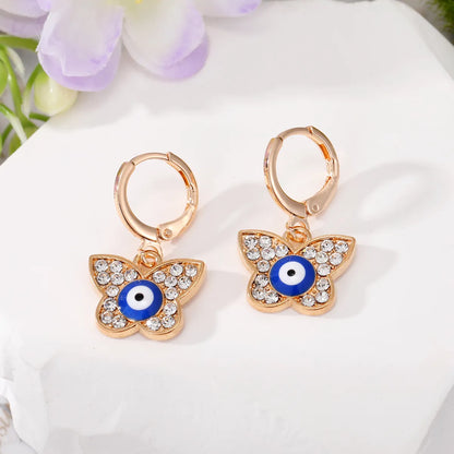 Wholesale Jewelry 1 Pair Retro Devil's Eye Butterfly Alloy Rhinestones Drop Earrings